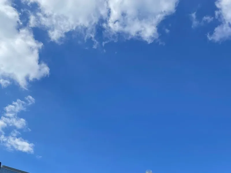 The Charlotte skyline and its uptown towers under a clear blue sky